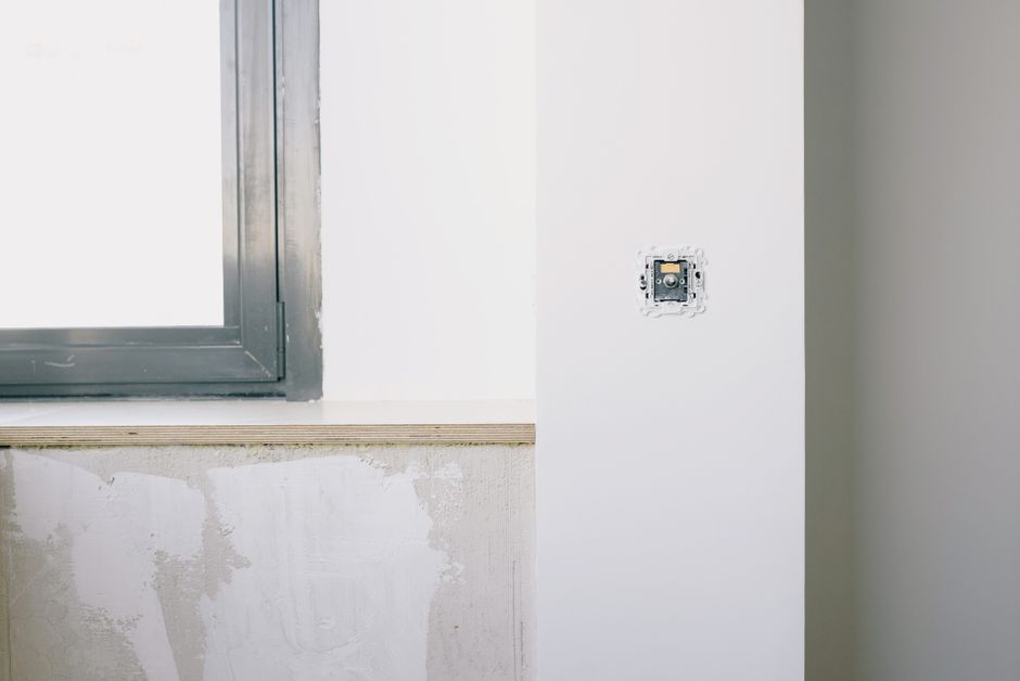Windows in the wall of a house, seen from outside