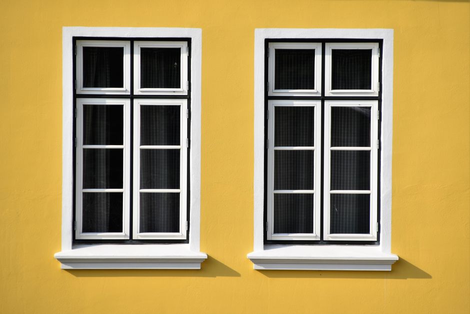 Windows in the wall of a house, seen from outside